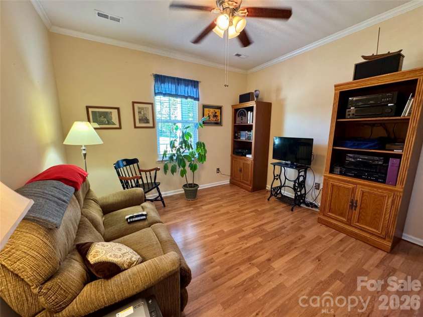 4633 Triumph Drive, Concord, NC 28027.  MLS# CAR4374411, YatesRealty ID 15247. Bedroom 1 is currently used as a den