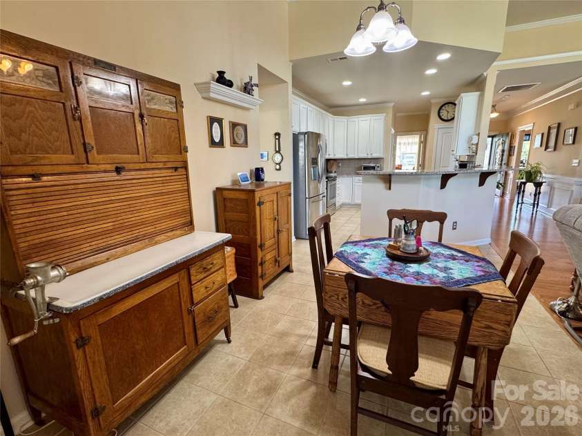 4633 Triumph Drive, Concord, NC 28027.  MLS# CAR4374411, YatesRealty ID 15247. Breakfast area