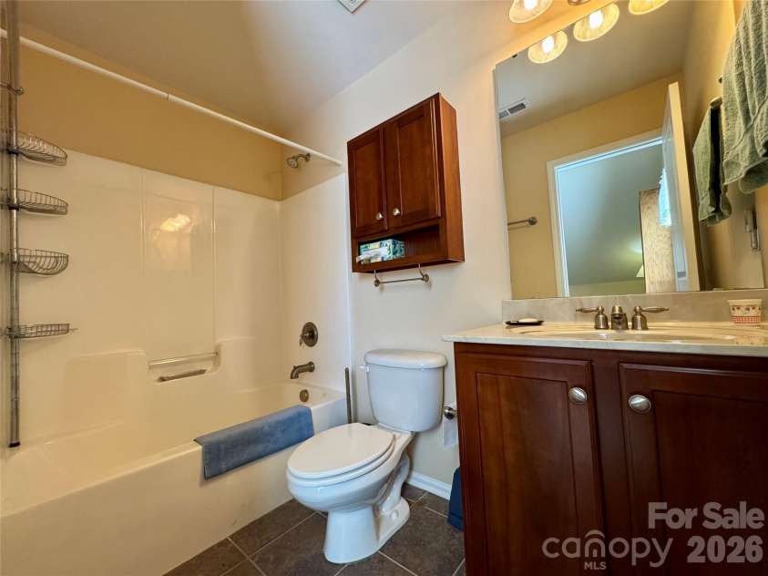 4633 Triumph Drive, Concord, NC 28027.  MLS# CAR4374411, YatesRealty ID 15247. Full bath upstairs adjoins the 4th bedroom/bonus