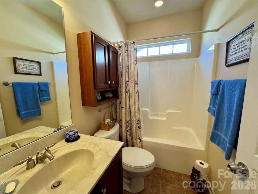 4633 Triumph Drive, Concord, NC 28027.  MLS# CAR4374411, YatesRealty ID 15247. Hall bath