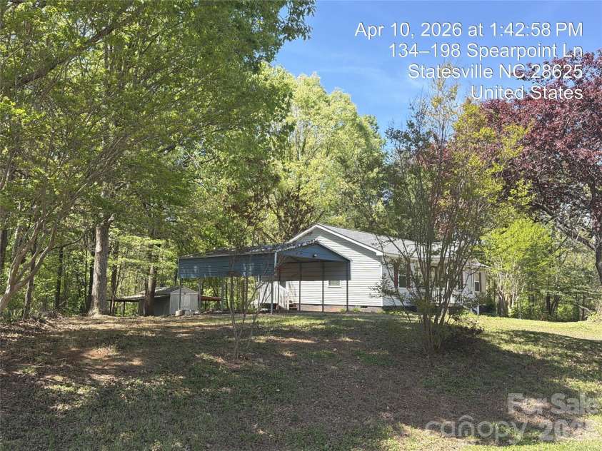 121 Spearpoint Lane, Statesville, NC 28625.  MLS# CAR4374440, YatesRealty ID 15248. 