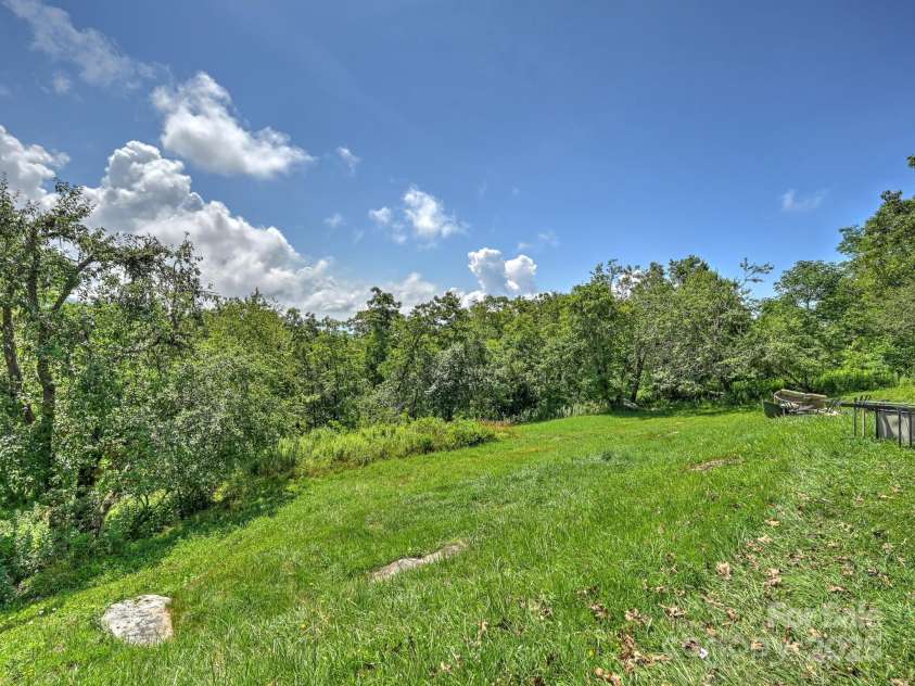 58 Randall Drive, Fairview, NC 28730.  MLS# CAR4263222, YatesRealty ID 15251. 