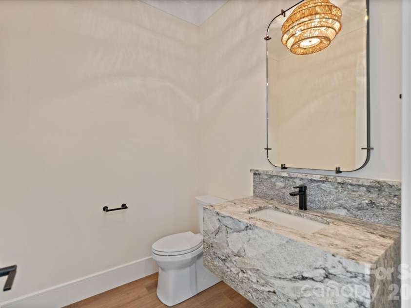 127 Tinker Place, Troutman, NC 28166.  MLS# CAR4394481, YatesRealty ID 15255. Basement half bathroom