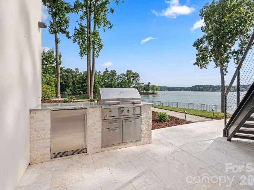 127 Tinker Place, Troutman, NC 28166.  MLS# CAR4394481, YatesRealty ID 15255. Built in Pro-Grade grill + beverage fridge