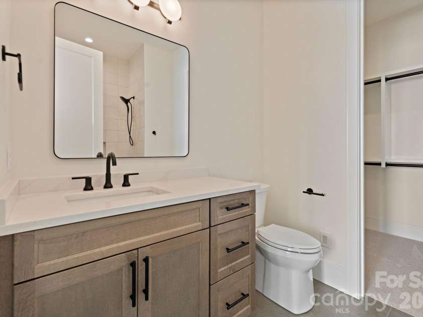 127 Tinker Place, Troutman, NC 28166.  MLS# CAR4394481, YatesRealty ID 15255. Ensuite bathroom