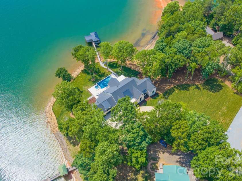 127 Tinker Place, Troutman, NC 28166.  MLS# CAR4394481, YatesRealty ID 15255. Your private oasis awaits