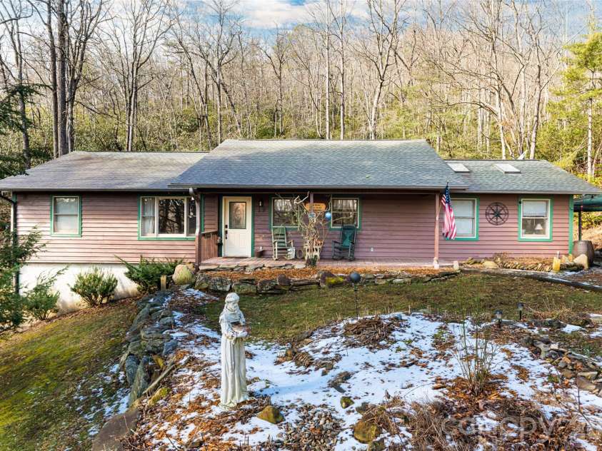 19 Forge Drive, Mills River, NC 28759.  MLS# CAR4344068, YatesRealty ID 1526. Beautiful seasonal landscaping and MatureTrees Frame the Home