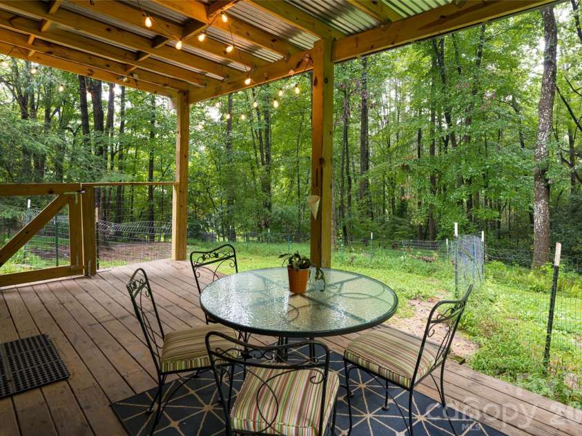 19 Forge Drive, Mills River, NC 28759.  MLS# CAR4344068, YatesRealty ID 1526. Covered Patio for Al-FrescoDining