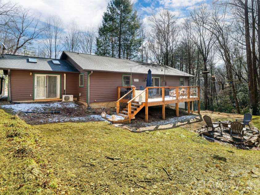 19 Forge Drive, Mills River, NC 28759.  MLS# CAR4344068, YatesRealty ID 1526. Exterior Stairs Connect Deckwith Back Yard