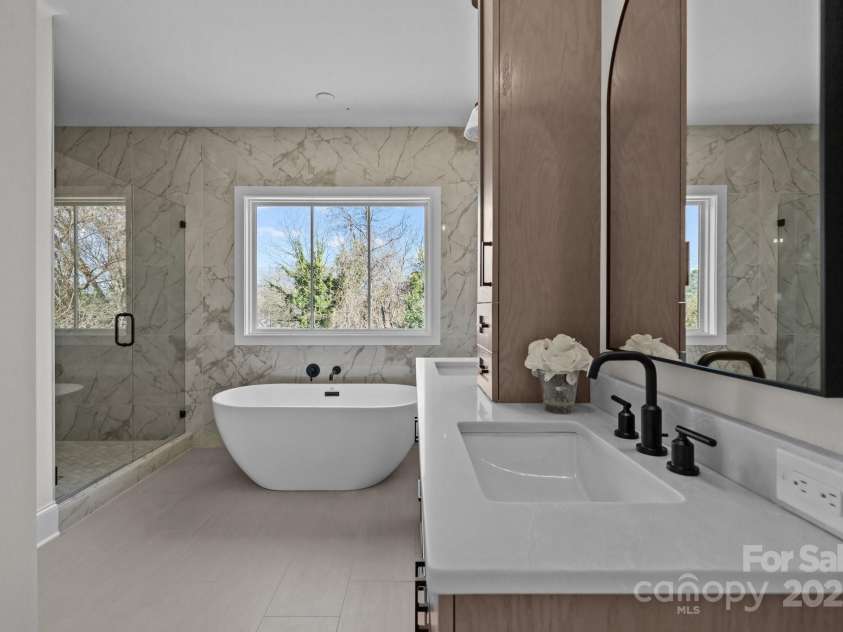 1828 Haines Street, Charlotte, NC 28216.  MLS# CAR4222253, YatesRealty ID 15262. Owner's bath