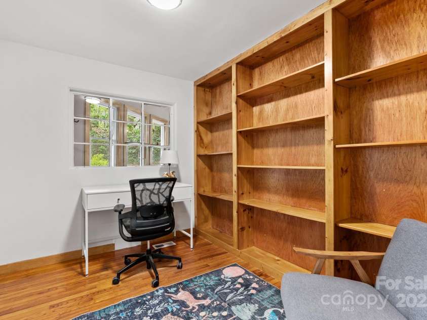 39 Hibriten Drive, Asheville, NC 28801.  MLS# CAR4251092, YatesRealty ID 15266. Cute Office w/ Bookshelves