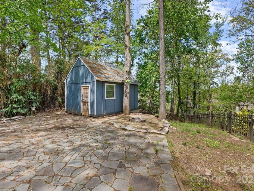 39 Hibriten Drive, Asheville, NC 28801.  MLS# CAR4251092, YatesRealty ID 15266. Storage Shed