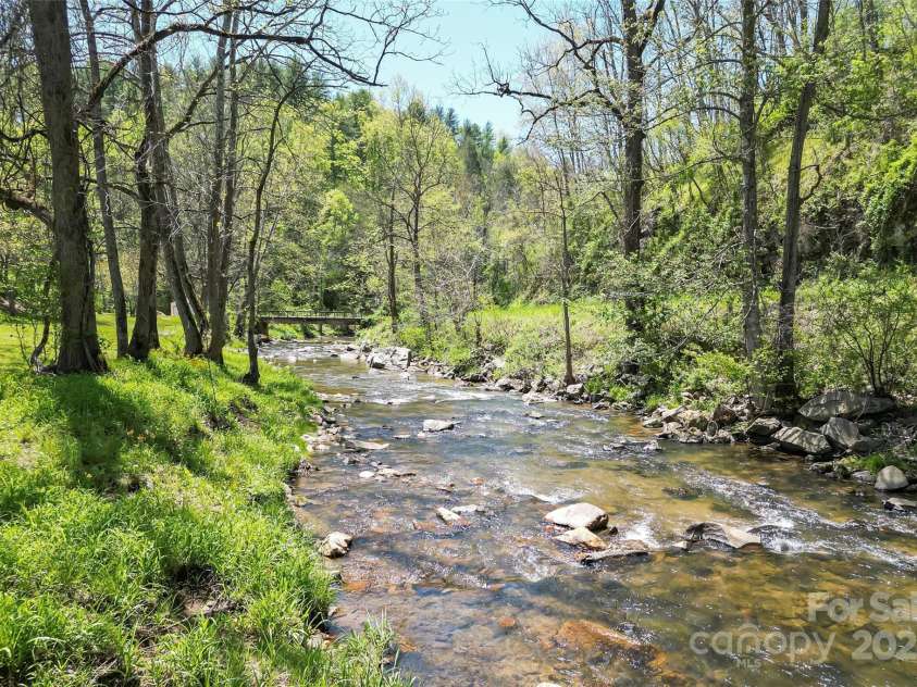 101 Garrison Road, Mars Hill, NC 28754.  MLS# CAR4252638, YatesRealty ID 15269. River in front and below