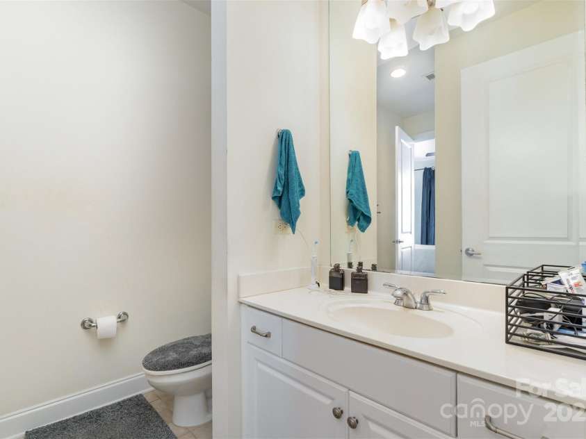 230 Tryon Street, Charlotte, NC 28202.  MLS# CAR4321048, YatesRealty ID 1527. Different view of bathroom