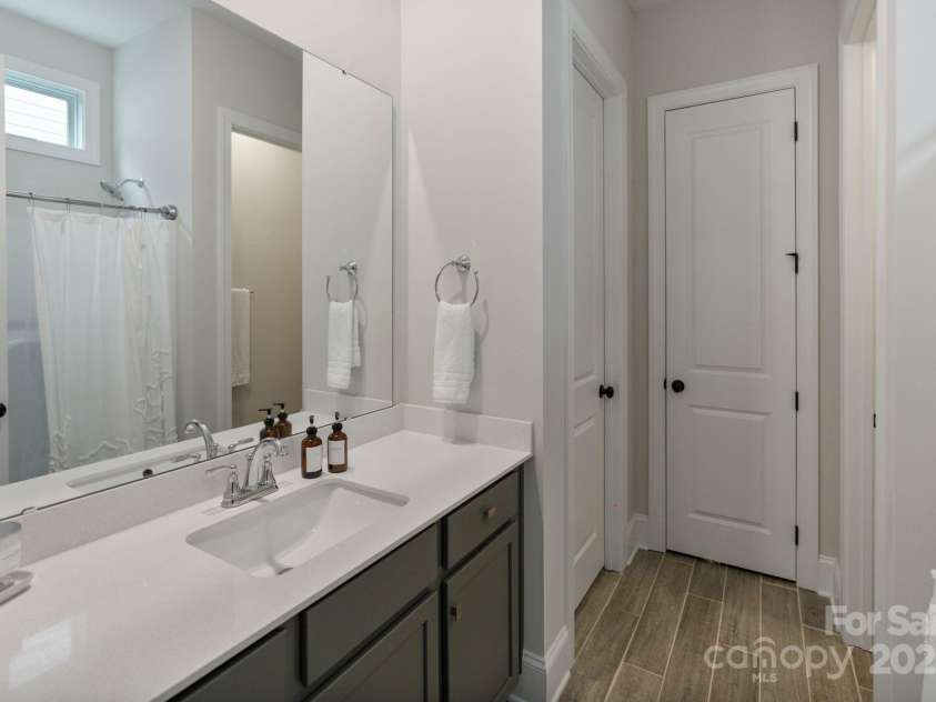 4159 Millstream Road, Denver, NC 28037.  MLS# CAR4221919, YatesRealty ID 15274. 1st floor guest en suite bathroom