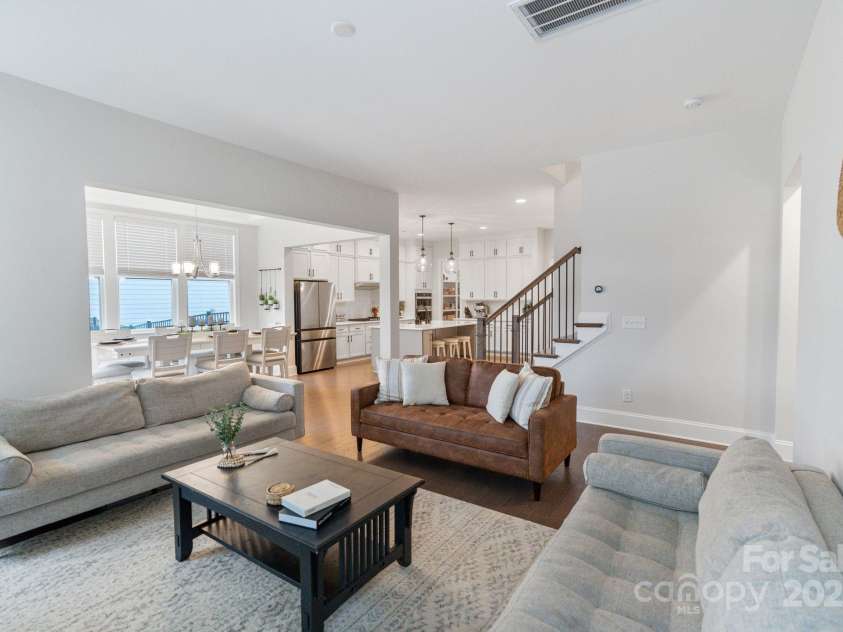 4159 Millstream Road, Denver, NC 28037.  MLS# CAR4221919, YatesRealty ID 15274. Living room with fireplace into the living room