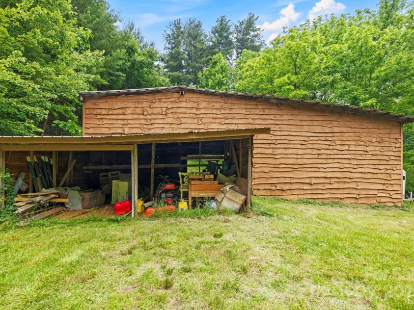 51 HOMEFIRE COVE Cove, Leicester, NC 28748.  MLS# CAR4269158, YatesRealty ID 1528. Equipment barn off driveway