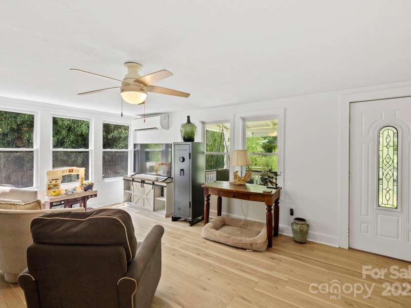 51 HOMEFIRE COVE Cove, Leicester, NC 28748.  MLS# CAR4269158, YatesRealty ID 1528. Light and bright living area