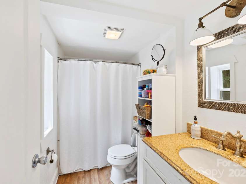 51 HOMEFIRE COVE Cove, Leicester, NC 28748.  MLS# CAR4269158, YatesRealty ID 1528. Main floor bathroom