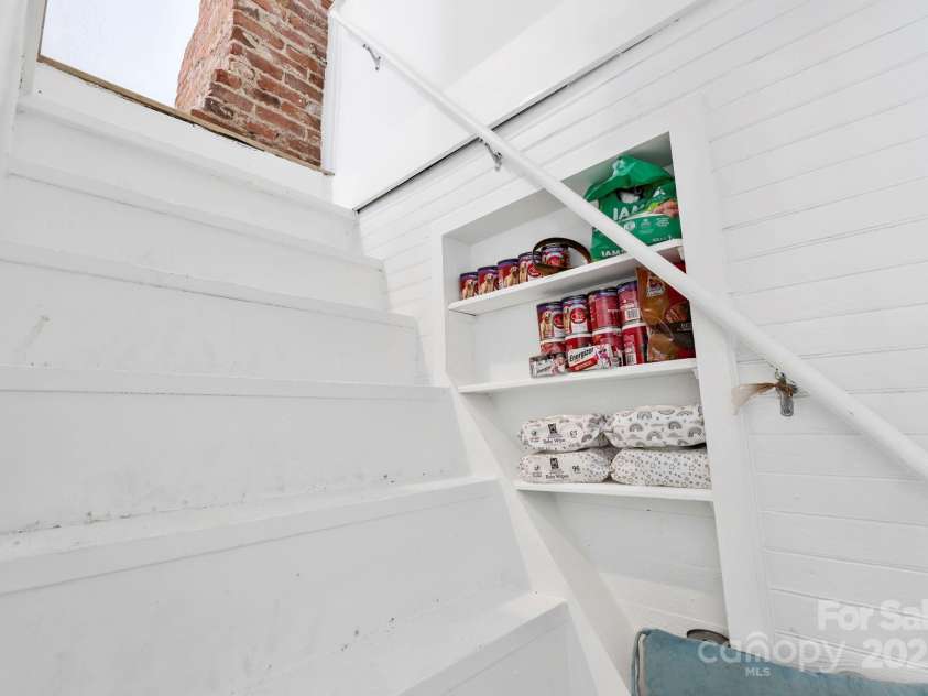 51 HOMEFIRE COVE Cove, Leicester, NC 28748.  MLS# CAR4269158, YatesRealty ID 1528. Stairway to loft