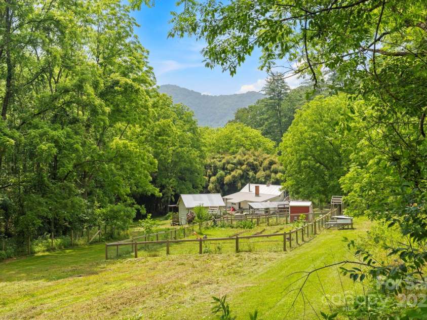 51 HOMEFIRE COVE Cove, Leicester, NC 28748.  MLS# CAR4269158, YatesRealty ID 1528. Truly nestled in Potato Gap 