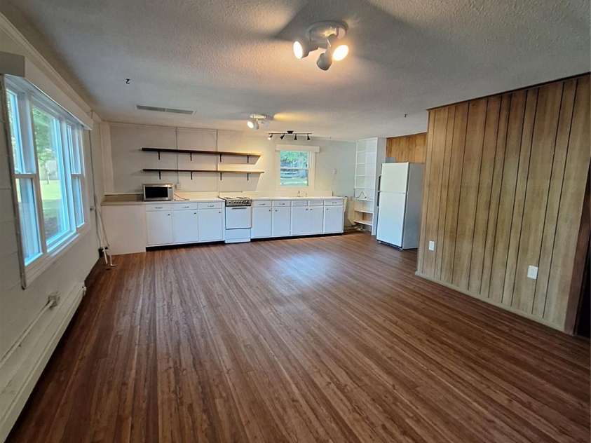 14623 Lucia Riverbend Highway, Stanley, NC 28164.  MLS# CAR4373851, YatesRealty ID 15282. Kitchen and Living room