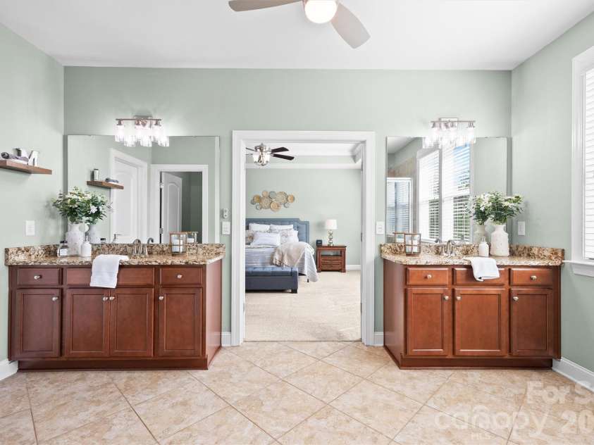 301 Jude Lane, Waxhaw, NC 28173.  MLS# CAR4369449, YatesRealty ID 15287. Granite Counters on Separated Vanities
