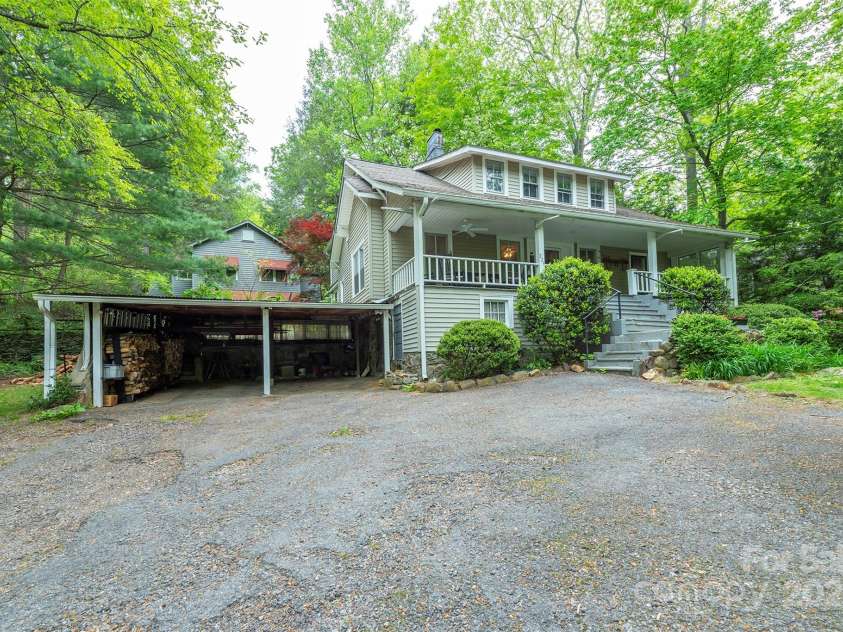 223 Assembly Drive, Montreat, NC 28757.  MLS# CAR4256904, YatesRealty ID 15288. Carport for two cars and dry storage.