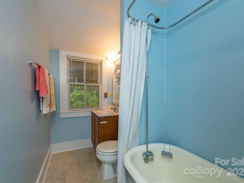 223 Assembly Drive, Montreat, NC 28757.  MLS# CAR4256904, YatesRealty ID 15288. Smaller of two Full BA upstairs.