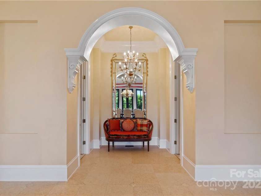 18019 Harbor Light Boulevard, Cornelius, NC 28031.  MLS# CAR3895525, YatesRealty ID 1529. Foyer for His/Her powder baths