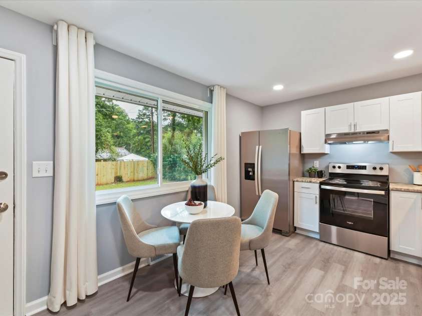 2508 Carrington Court, Charlotte, NC 28208.  MLS# CAR4288824, YatesRealty ID 1529. Large new windows flood the space with light