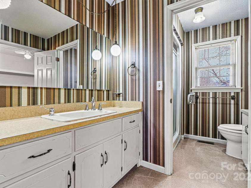 2 Honeysuckle Way, Granite Falls, NC 28630.  MLS# CAR4234653, YatesRealty ID 15292. Primary Bathroom/Shower Window View