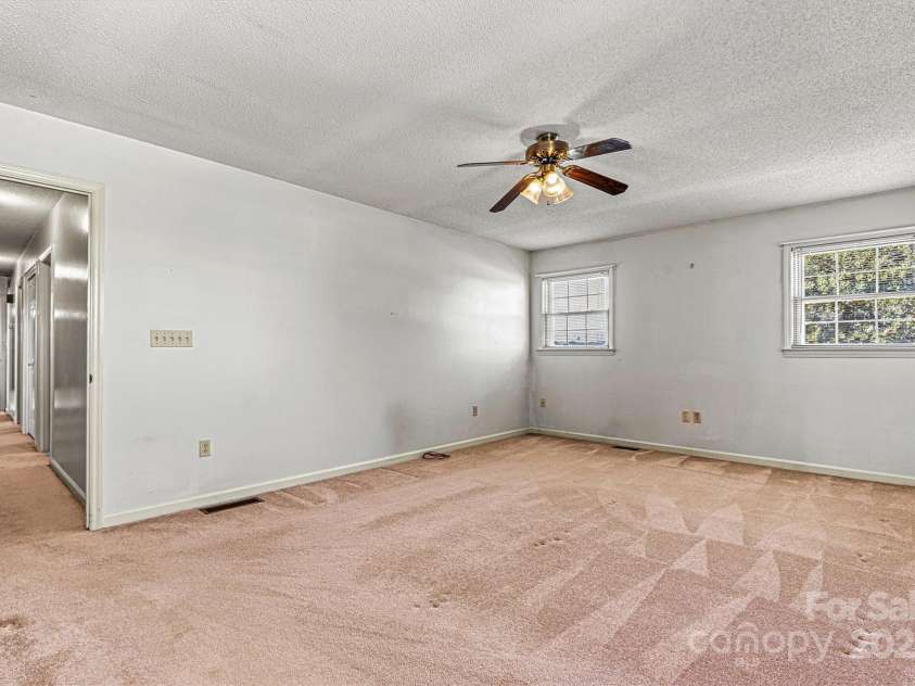 2 Honeysuckle Way, Granite Falls, NC 28630.  MLS# CAR4234653, YatesRealty ID 15292. Primary Bedroom/Hallway View