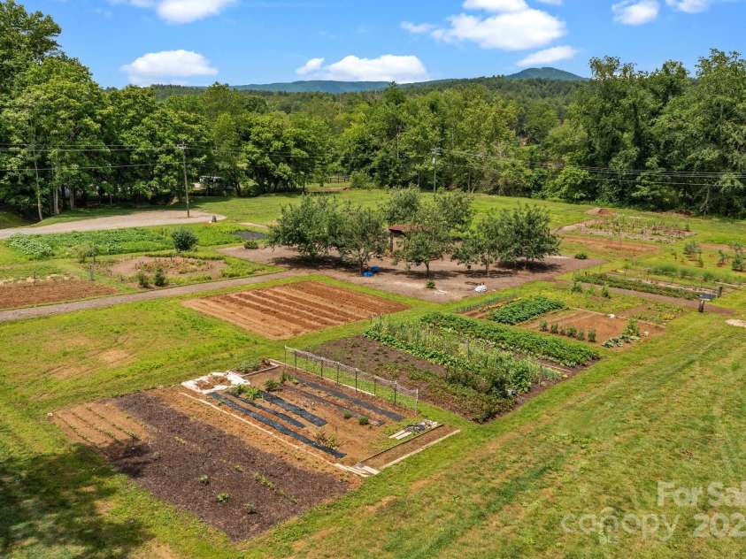 5360 Low Country Road, Lenoir, NC 28645.  MLS# CAR4252044, YatesRealty ID 15297. Community Gardens