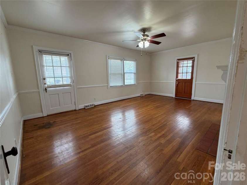 612 Ballard Street, Chester, SC 29706.  MLS# CAR4355125, YatesRealty ID 15297. Living room with convenient access through both the front and side doors