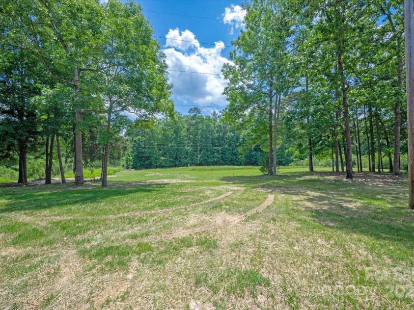 5033 Waxhaw Indian Trail Road, Matthews, NC 28104.  MLS# CAR4260801, YatesRealty ID 15299. 