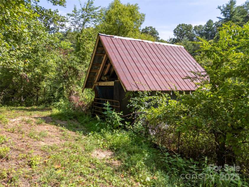 1084 Old Howard Gap Road, Saluda, NC 28773.  MLS# CAR4162081, YatesRealty ID 153. 