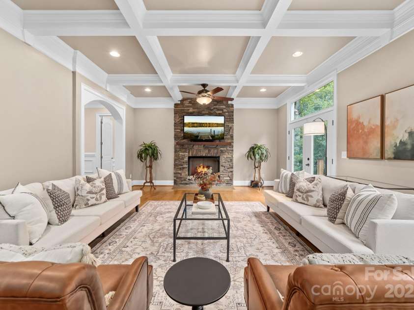 14504 Henry Harrison Stillwell Drive, Huntersville, NC 28078.  MLS# CAR4288907, YatesRealty ID 1530. Crawford Ceiling & Fireplace in Living Room