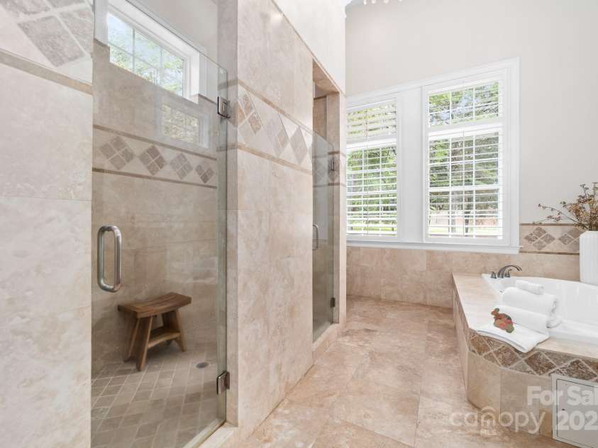 14504 Henry Harrison Stillwell Drive, Huntersville, NC 28078.  MLS# CAR4288907, YatesRealty ID 1530. Double shower in primary