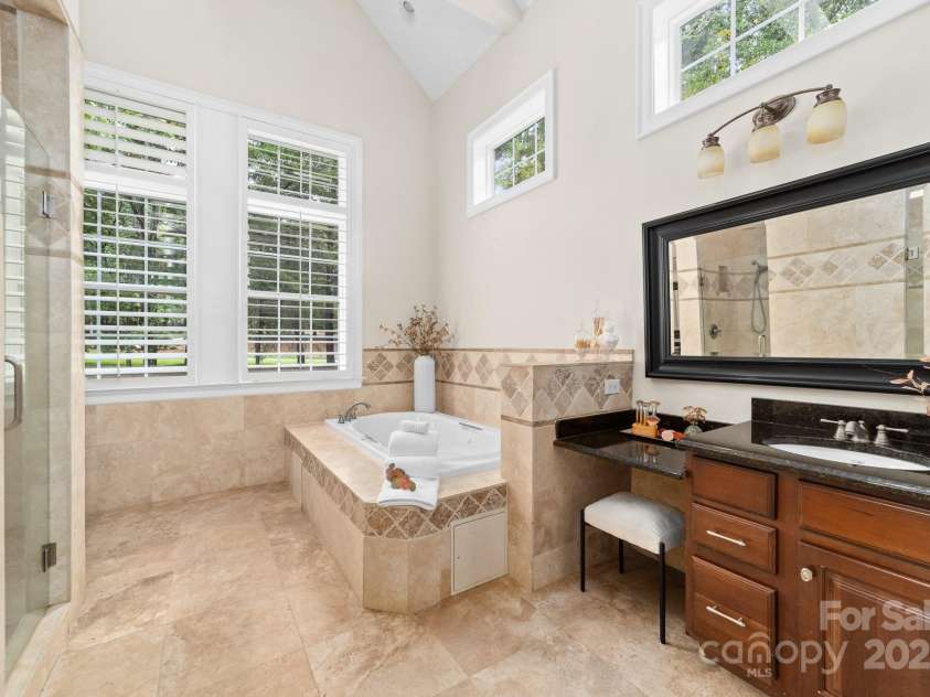 14504 Henry Harrison Stillwell Drive, Huntersville, NC 28078.  MLS# CAR4288907, YatesRealty ID 1530. Double vanity, full tub