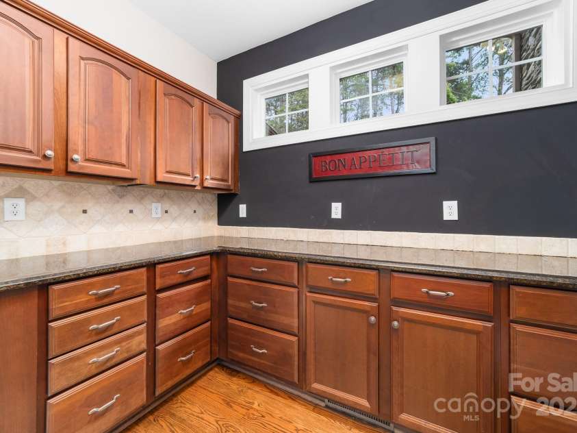 14504 Henry Harrison Stillwell Drive, Huntersville, NC 28078.  MLS# CAR4288907, YatesRealty ID 1530. Main floor butler's pantry 