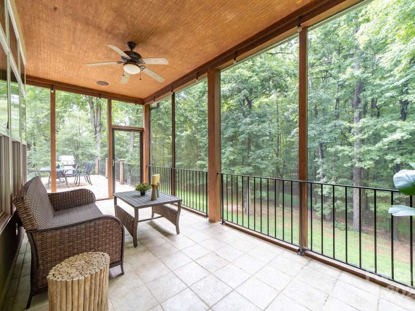14504 Henry Harrison Stillwell Drive, Huntersville, NC 28078.  MLS# CAR4288907, YatesRealty ID 1530. Screened in porch view to outdoor deck