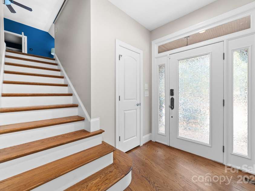 14504 Henry Harrison Stillwell Drive, Huntersville, NC 28078.  MLS# CAR4288907, YatesRealty ID 1530. Second set of stairs near side entry to home