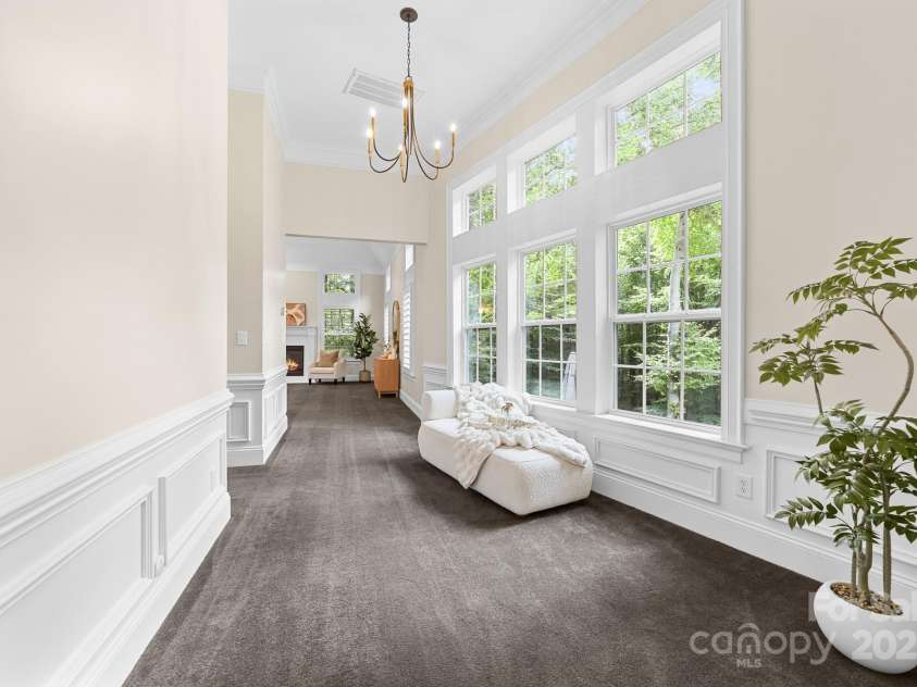 14504 Henry Harrison Stillwell Drive, Huntersville, NC 28078.  MLS# CAR4288907, YatesRealty ID 1530. Sitting area in main floor primary