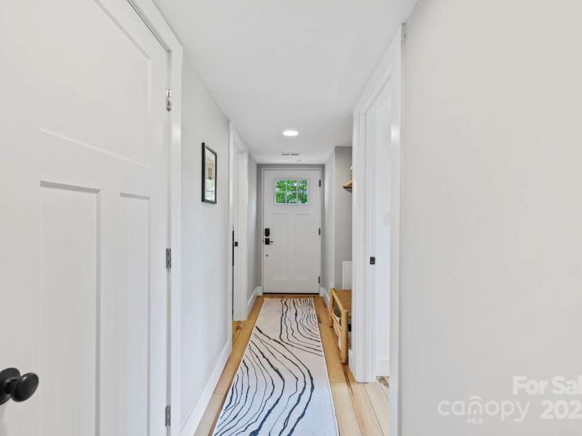 131 John Knox Road, Montreat, NC 28757.  MLS# CAR4254614, YatesRealty ID 15300. Hall~ Basement