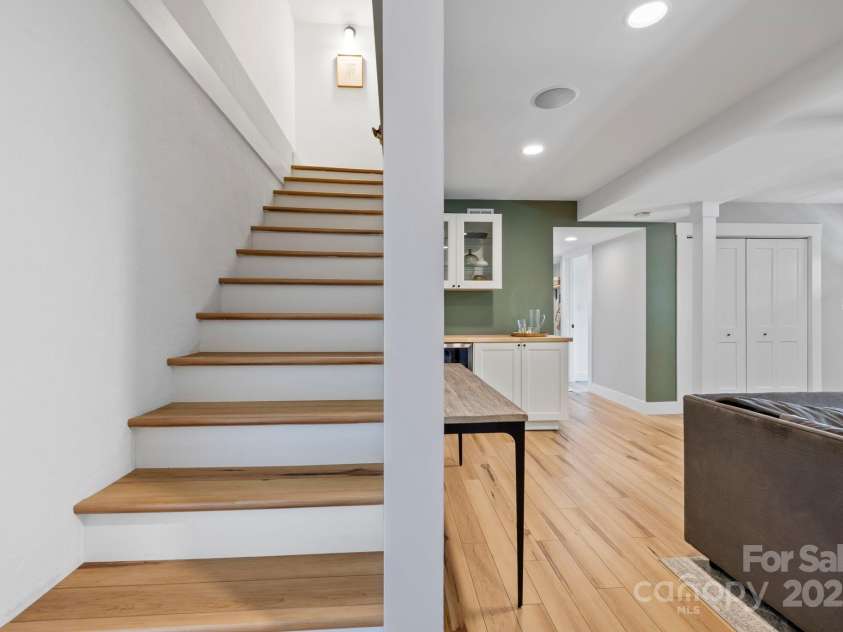 131 John Knox Road, Montreat, NC 28757.  MLS# CAR4254614, YatesRealty ID 15300. Stairs from Basement to Main Level