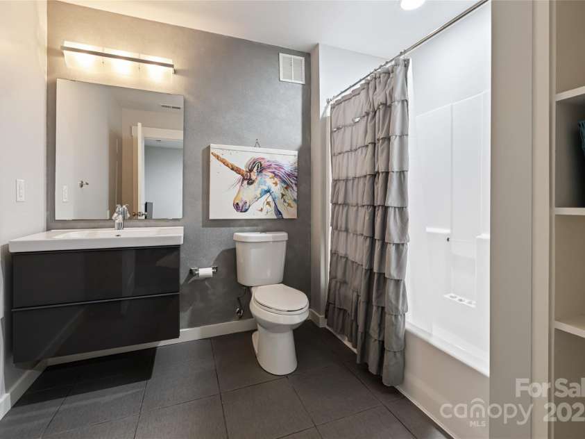 31 White Pine Drive, Asheville, NC 28805.  MLS# CAR4227367, YatesRealty ID 15303. Lower level bathroom