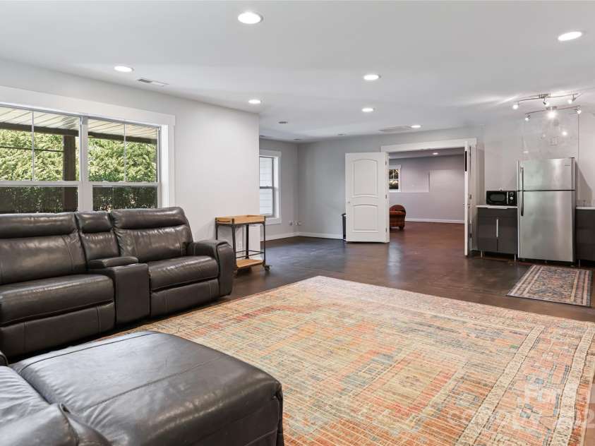 31 White Pine Drive, Asheville, NC 28805.  MLS# CAR4227367, YatesRealty ID 15303. Lower level family room