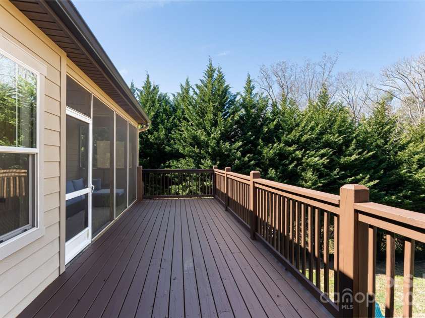31 White Pine Drive, Asheville, NC 28805.  MLS# CAR4227367, YatesRealty ID 15303. Main level back deck