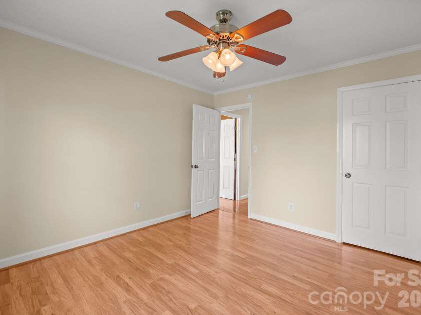 7737 Ridgeloch Place, Charlotte, NC 28226.  MLS# CAR4357956, YatesRealty ID 15304. Primary Bedroom 